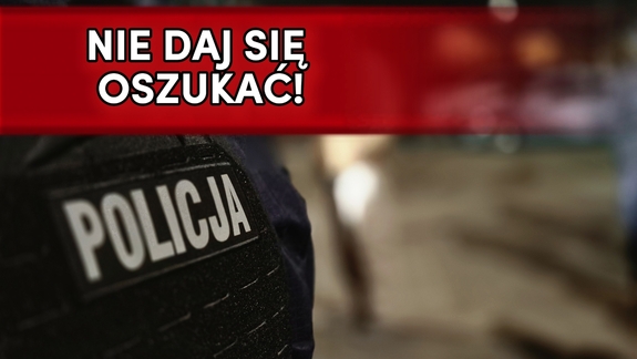 Napis policja na mundurze.